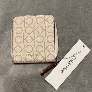 Calvin Klein Cream Monogram Zip Wallet